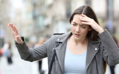 Man experiencing blurred vision, dizziness, and balance difficulties, highlighting early neurological warning signs requiring medical evaluation.