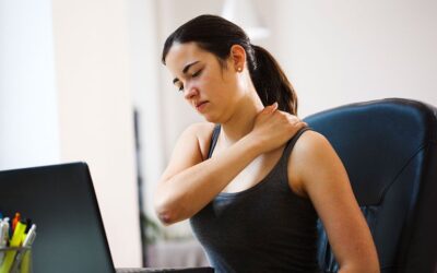 Woman suffering from chronic spine pain despite medication due to an underlying untreated spinal condition
